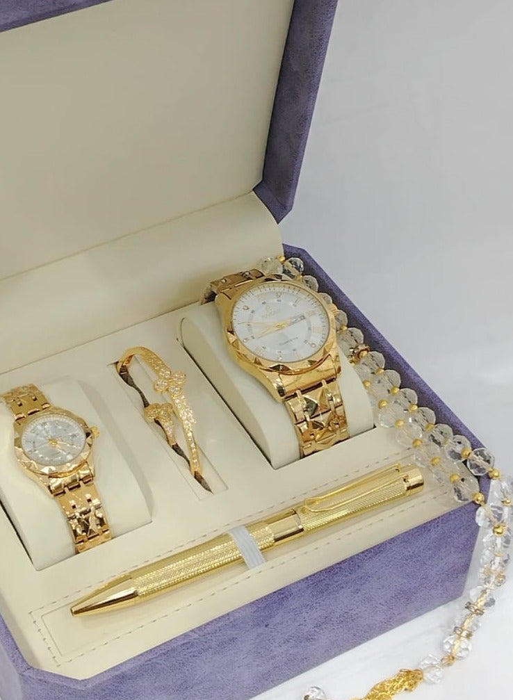 Watch set consisting of a men's watch, a women's watch, a pen, a bracelet, and a ring.