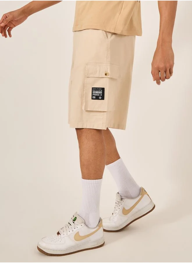 ستايلي Styli Rip Stop Cargo Oversized Shorts with Pocket Badge Detail