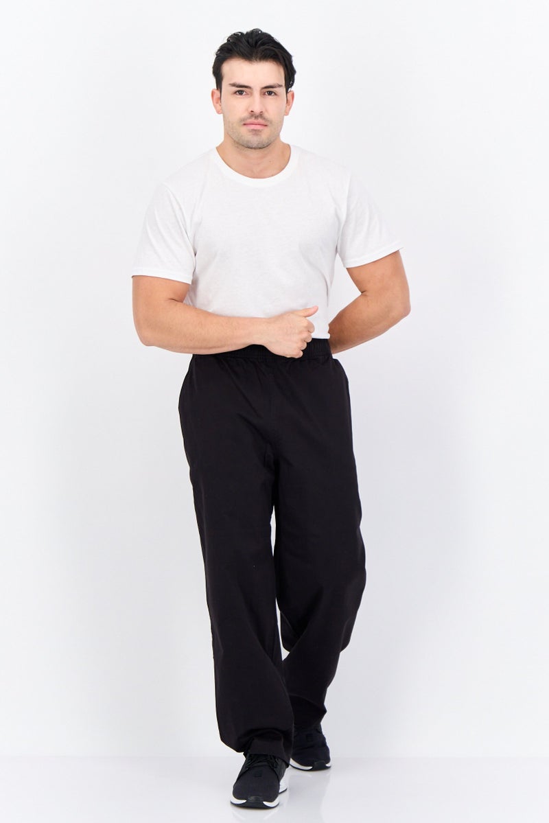 PUMA Men Sportswear Fit Outdoors Track Pants, Black - Image 4