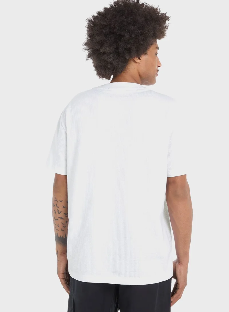 Calvin Klein Jeans Logo Front Pocket T-Shirt