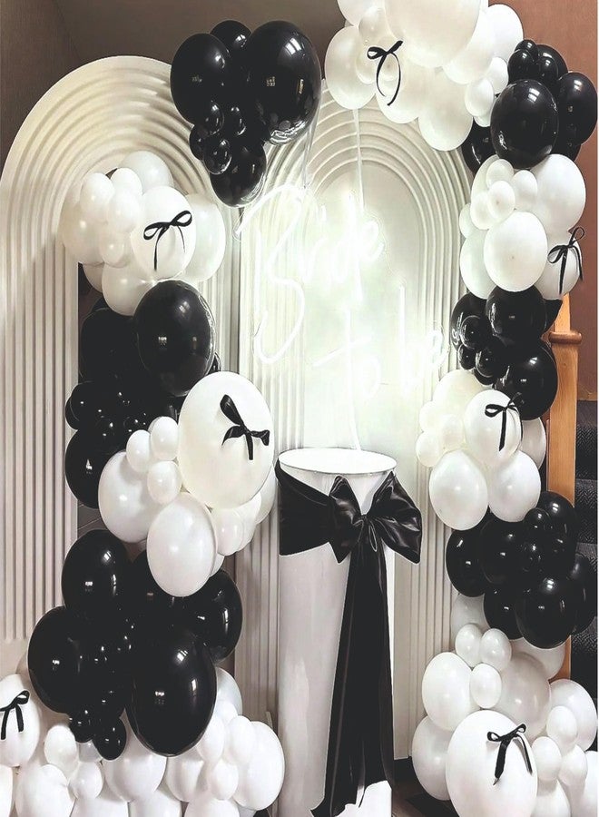 YOURS DECOR مجموعة يورز ديكور من 56 بالونًا أبيض وأسود مع فيونكة سوداء لتزيين حفلات أعياد الميلاد، والحفلات ذات الطابع الخاص، وديكور المنزل - Image 1