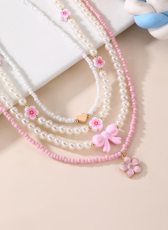 Take Two Pack of 4 - Pink Flower and Bow Beaded Necklace - Image 1