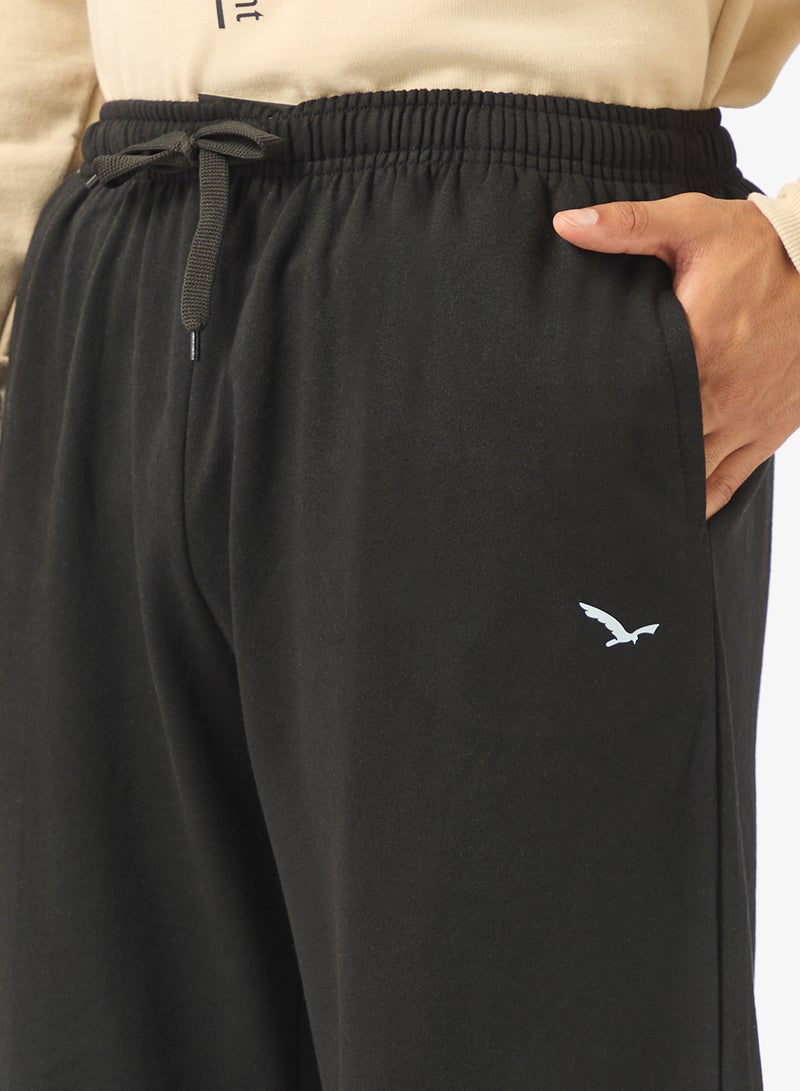 سفنتي فايف بيسيكس بنطلون رياضي فضفاض بتصميم جرافيك - Image 4