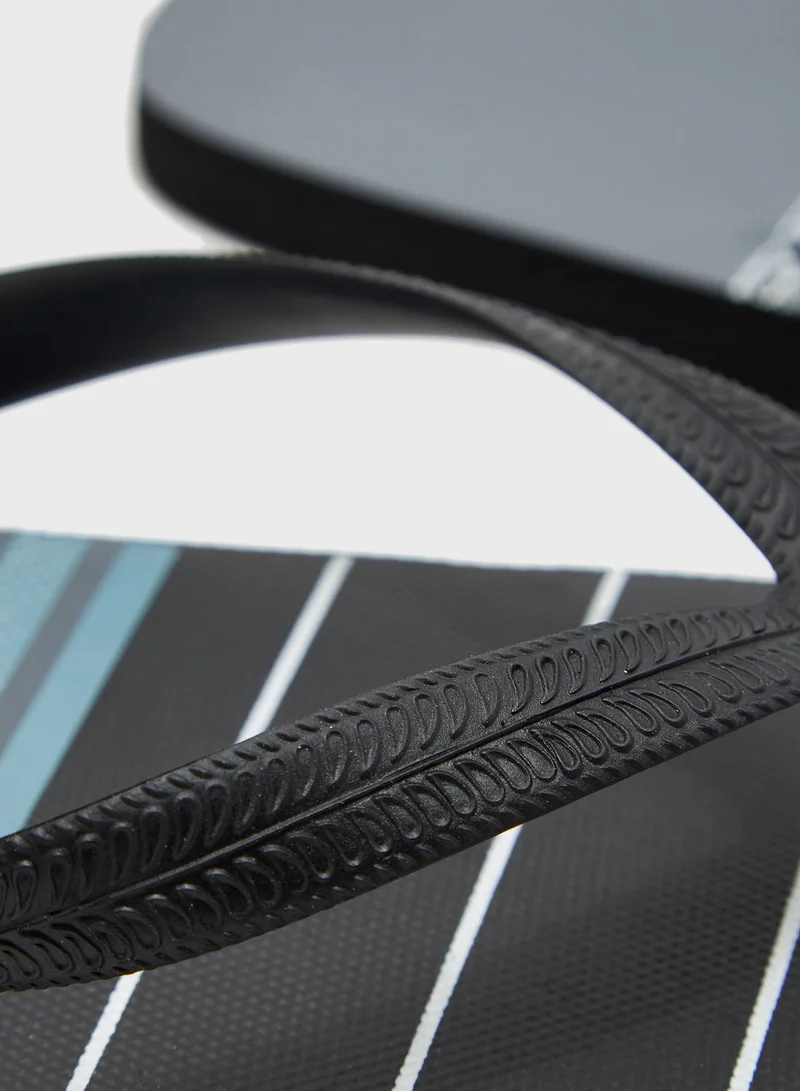 Seventy Five Stripe Print Flip Flops