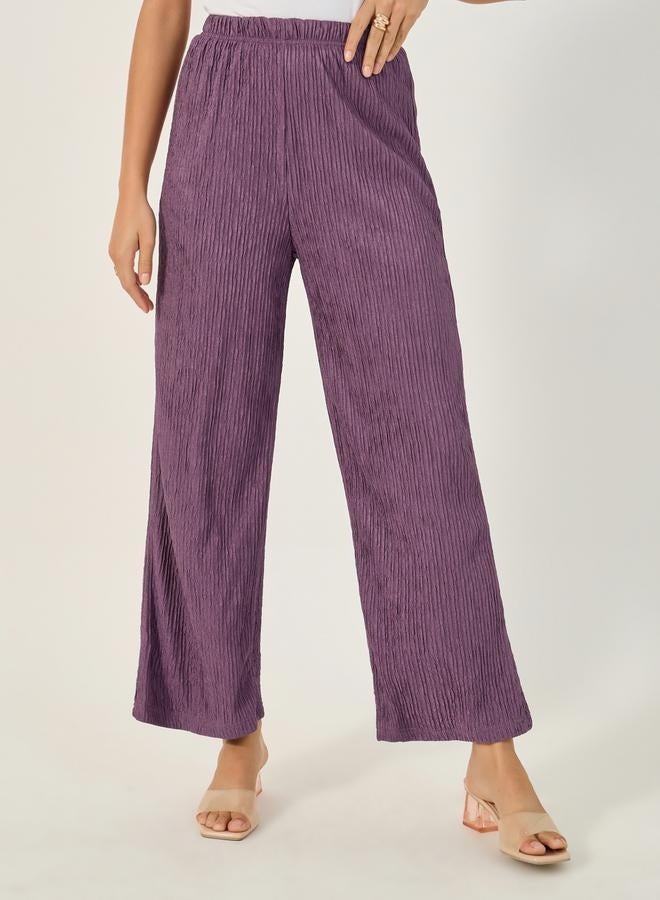 ستايلي بنطلون واسع بخصر متوسط وخصر مطاطي بنقوش بارزة - Image 2