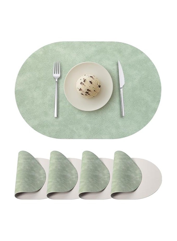 طقم مفارش صحون بيضاوية من 4 قطع، مفارش صحون من الجلد الصناعي لطاولة الطعام، مفارش صحون مزدوجة الجوانب مقاومة للحرارة قابلة للغسل والمسح للطاولة في الأماكن الخارجية الداخلية، أخضر/بيج - Image 1