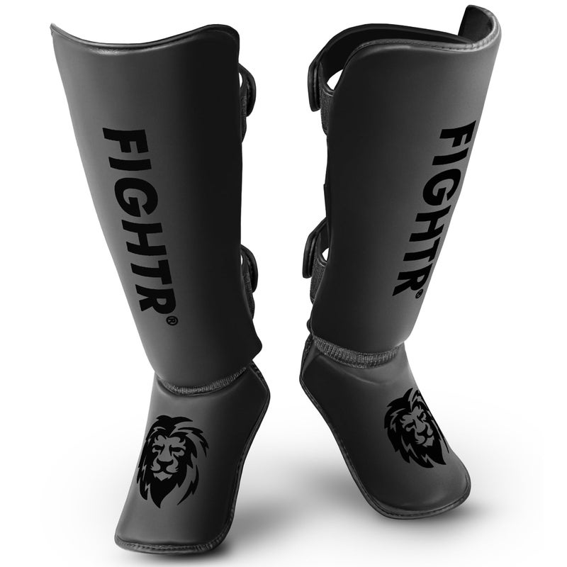 FIGHTR حراس الساق FIGHTRÂ® - مع حشوة مثالية | حماية سميكة للساق للركلات في الكيك بوكسينغ، MMA، موياي تاي وفنون القتال الأخرى - Image 1
