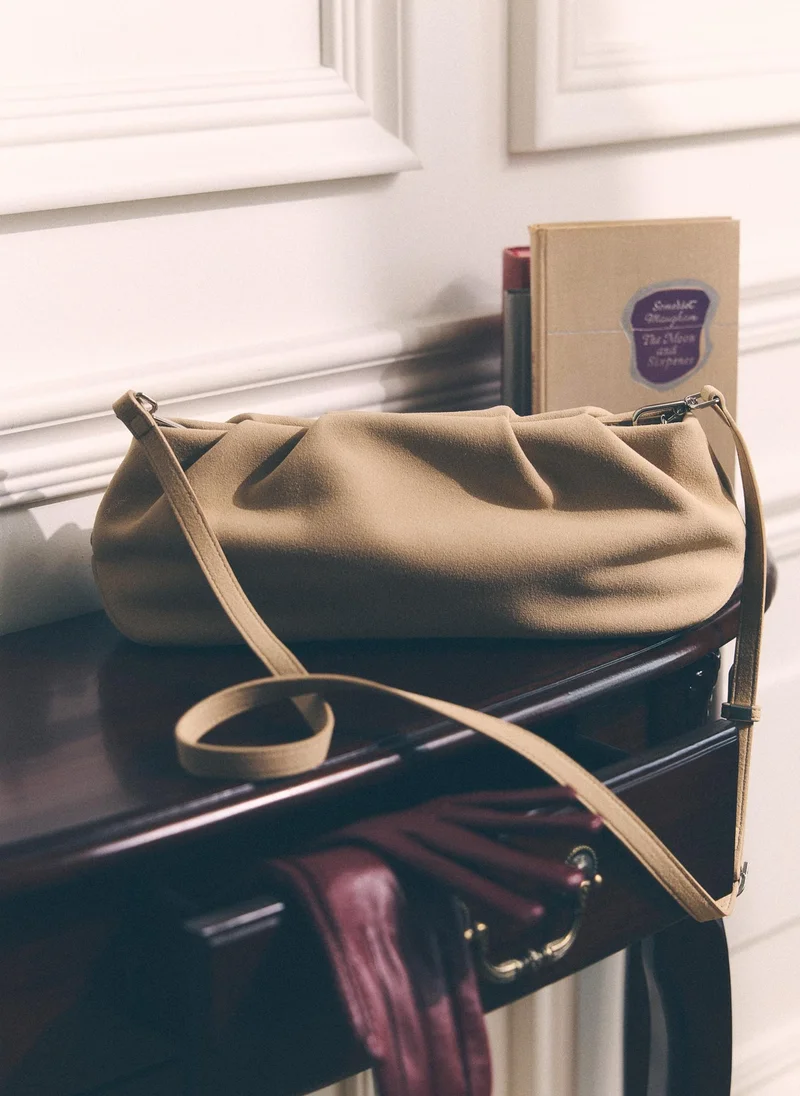 Lichi  Voluminous eco-leather clutch bag with a thin strap for Women | Best Price UAE