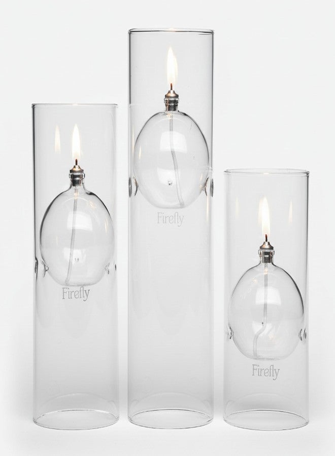 فايرفلاي شمعة زيت زجاجية قابلة لإعادة التعبئة من فايرفلاي فيولز - فانوس ترانسيند 8.38 بوصة بتصميم إعصار، للاستخدام الداخلي والخارجي. شمعة نظيفة مناسبة لتناول الطعام والمناسبات والإضاءة في حالات الطوارئ. تُستخدم مع البارافين السائل أو زيت المصابيح. - Image 1