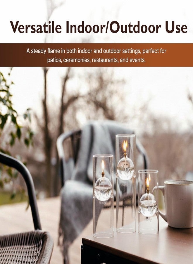 فايرفلاي شمعة زيت زجاجية قابلة لإعادة التعبئة من فايرفلاي فيولز - فانوس ترانسيند 8.38 بوصة بتصميم إعصار، للاستخدام الداخلي والخارجي. شمعة نظيفة مناسبة لتناول الطعام والمناسبات والإضاءة في حالات الطوارئ. تُستخدم مع البارافين السائل أو زيت المصابيح. - Image 4