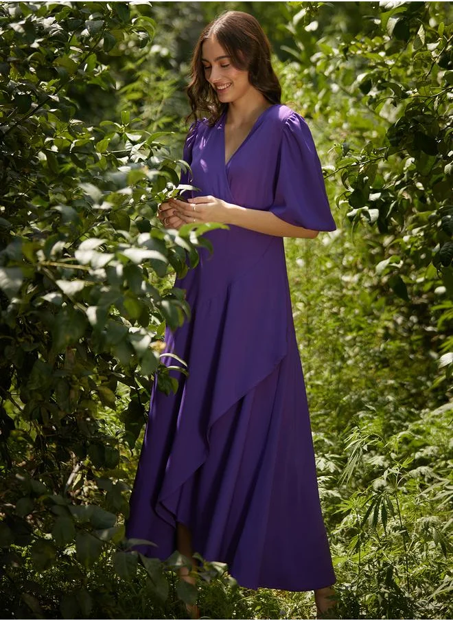 FEMELLA Wrap Ruffle Maxi Dress with Cuffed Sleeve by Styli