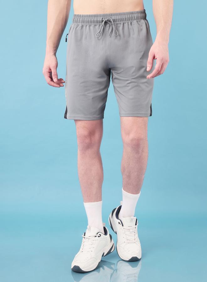 تكنوسبورت شورت تكنوسبورت سادة بأربعة اتجاهات مطاطية - Image 1