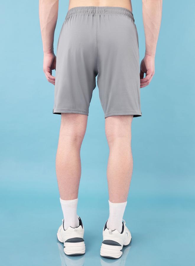 تكنوسبورت شورت تكنوسبورت سادة بأربعة اتجاهات مطاطية - Image 3