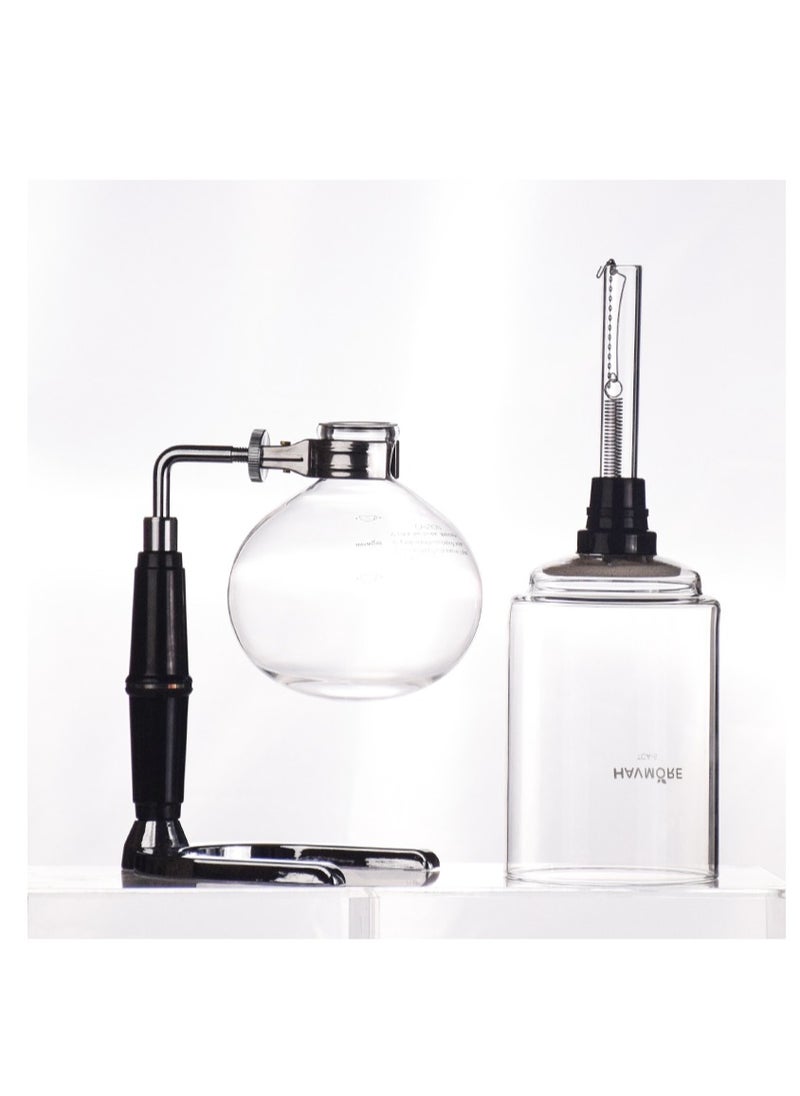 Seven Two Seven - Experience the art of making coffee with the Glass Siphon Coffee Maker This innovative machine is crafted with precision and elegance, and adds a touch of sophistication to your coffee ritual. - Image 1