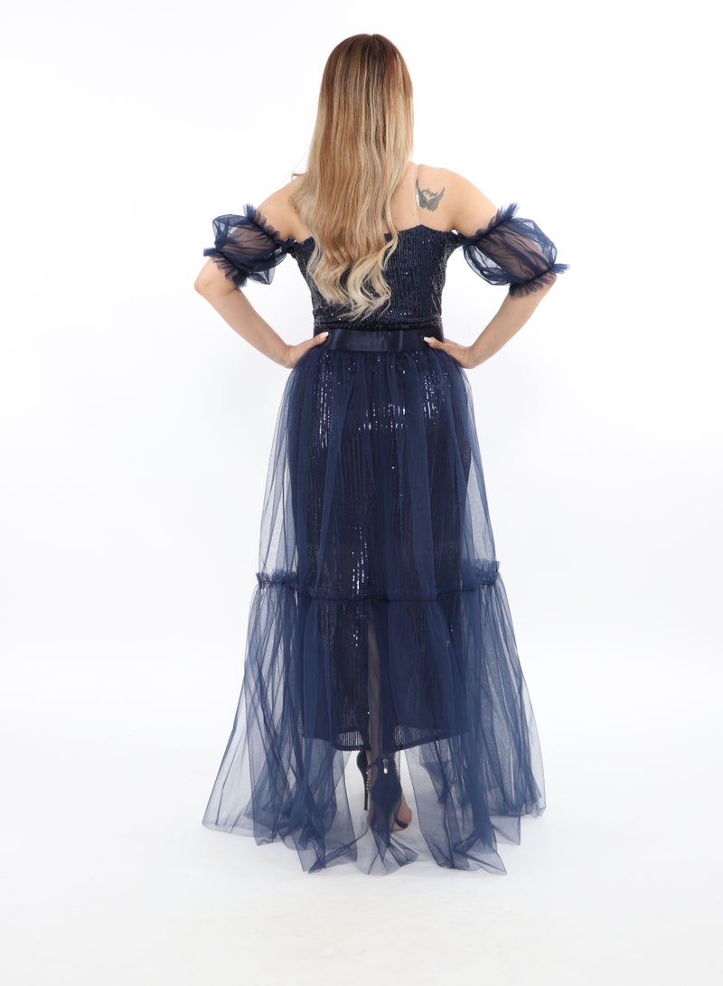 An Elegant Open Top Sequin Dress With A Train And Sleeves  - Image 3