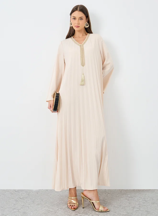 ستايلي Styli Women Cream Pleated Jalabiya with Tassel Trim