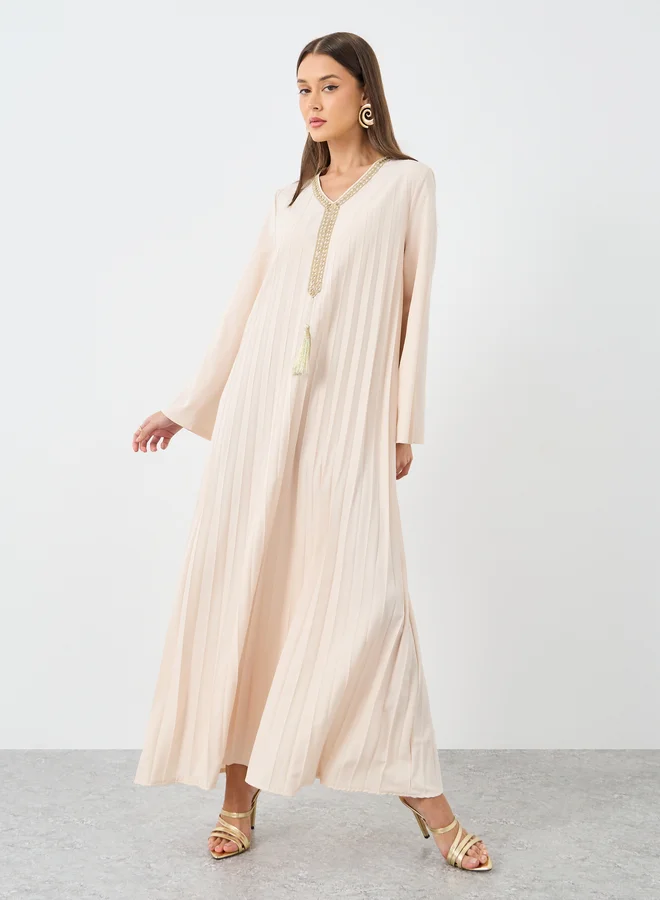 ستايلي Styli Women Cream Pleated Jalabiya with Tassel Trim