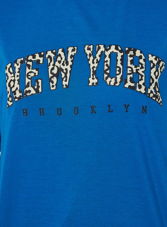Styli Styli Leopard Slogan Print Boxy Fit Round Neck T-shirtâ€‹
