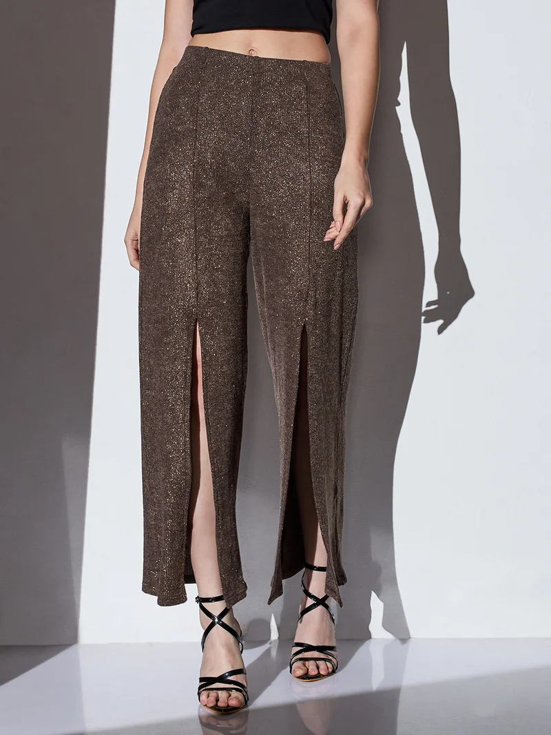 جلو باص بنطلون نسائي واسع الساق بخصر متوسط وخطوط لامعة وفتحة أمامية