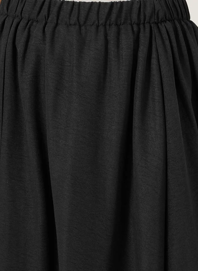 ستايلي جيبة بالون وردي سادة بخصر مطاطي من Styli