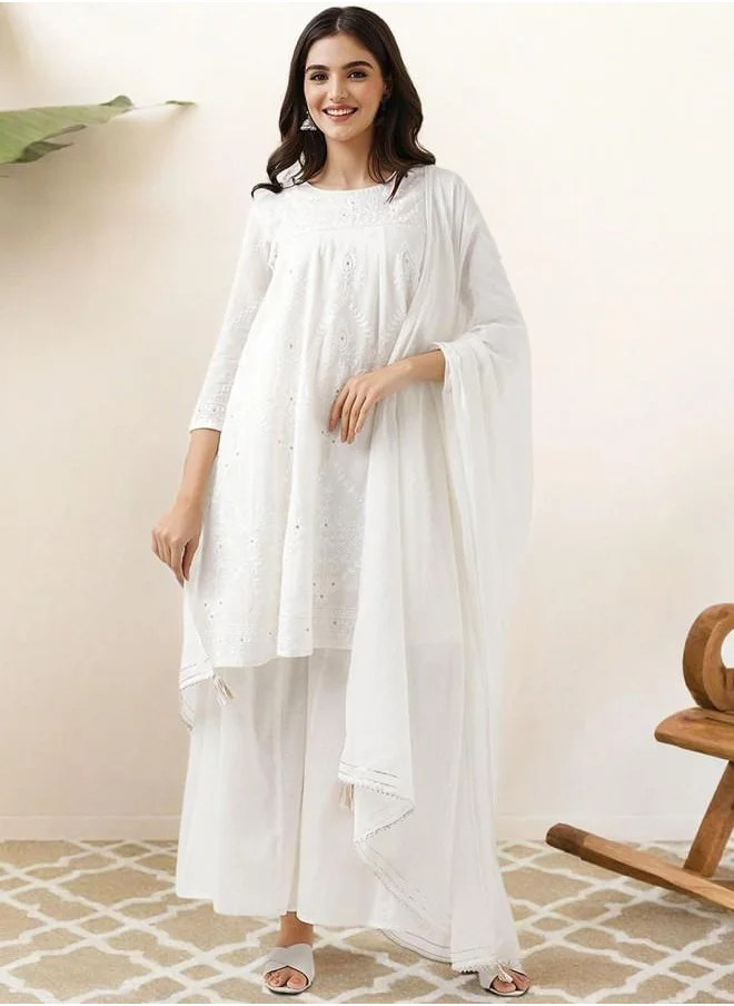 آي شين Festive Women Off White Cotton Kurta Set with Embroidered pattern Tunic and Palazzo features a Round neckline and Three-Fourth Sleeve secured with Elastic closure and styled in Straight Fit ideal for Festive moments — exude elegance in every glance.