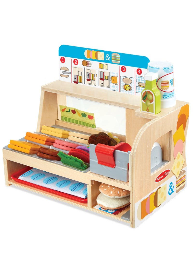 Melissa & Doug Wooden Slice & Stack Sandwich Counter – Pretend Play Deli Set with Wooden Sandwich Ingredients, Play Money, Utensils & Storage – Imaginative Role-Play Toy for Kids Ages 3+ | MD31650 - Image 1