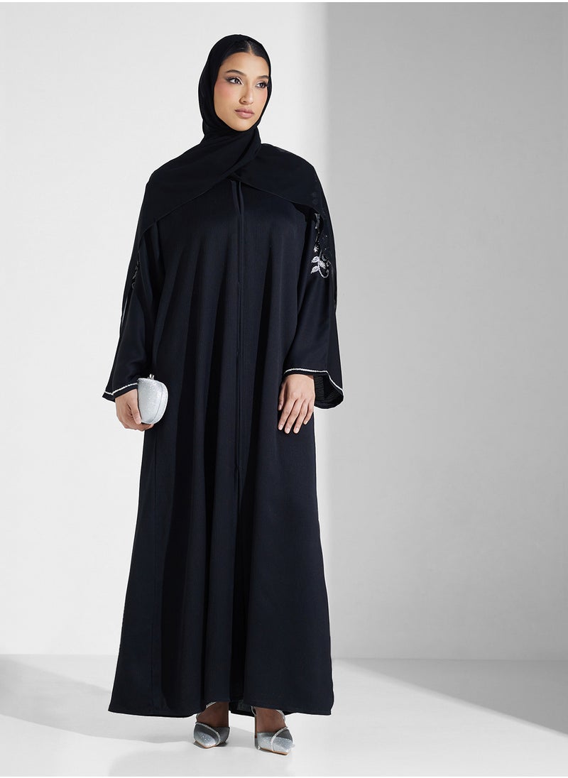 Embellished Flared Sleeve Abaya - pzsku/Z29B5EEB84642B0601A98Z/45/_/1738648095/d0cbe518-fc08-4e98-a66b-8f94ee37958a