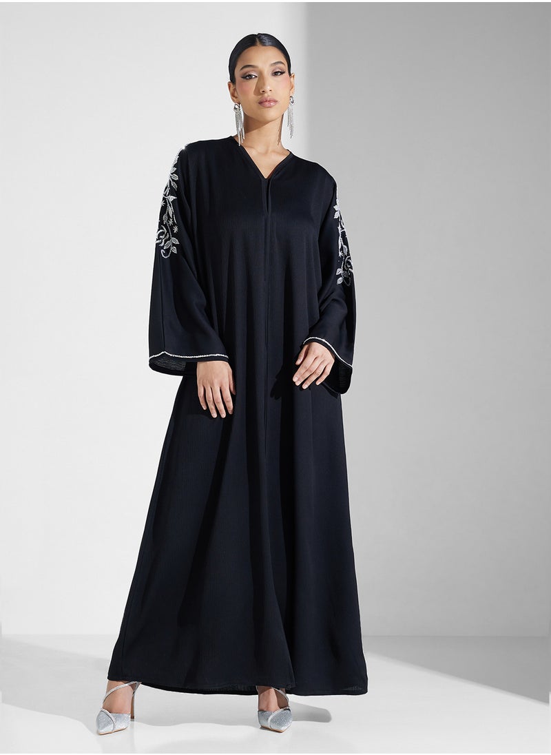 Embellished Flared Sleeve Abaya - pzsku/Z29B5EEB84642B0601A98Z/45/_/1738648098/39b032c3-e782-4b94-bfd3-9cfe8708df7f