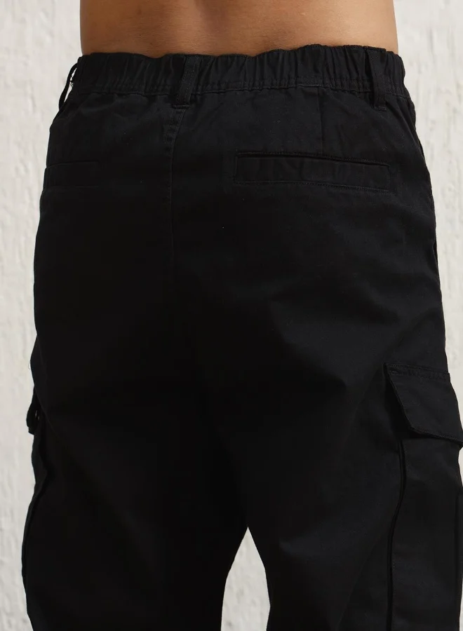 Hubberholme black Men's Black Cotton Blend Solid Pattern Full Length Cargo Relaxed Trouser for Men | Best Price UAE