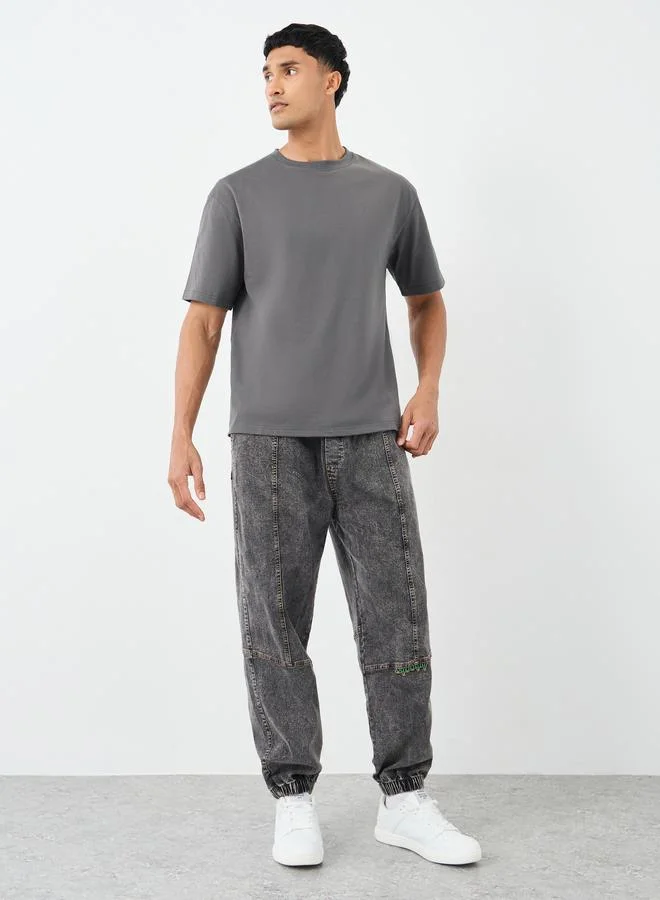 Styli Styli Slogan Back Print Crew Neck Oversized T-Shirt