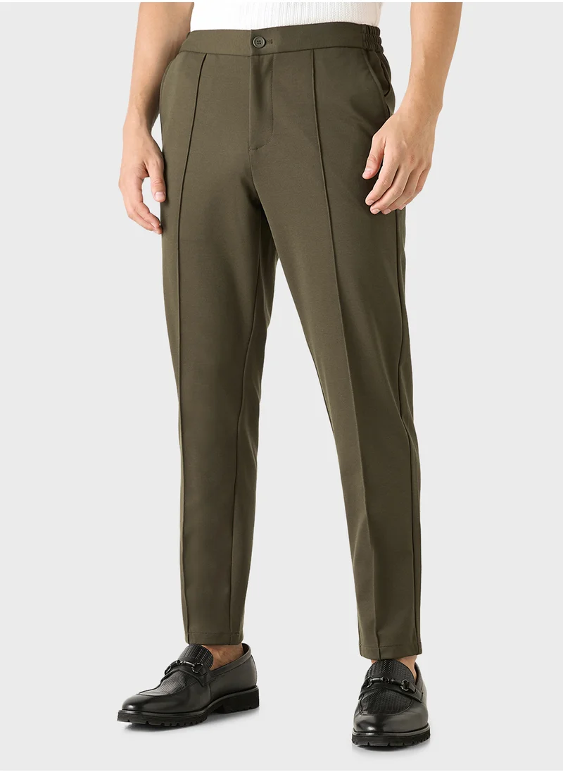 ايكونيك Iconic Solid Slim Fit Trousers with Pockets