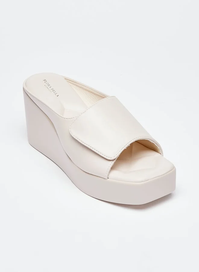 فلورا بيلا من شو إكسبرس Women Solid Slip-On Flatform Heels Sandals