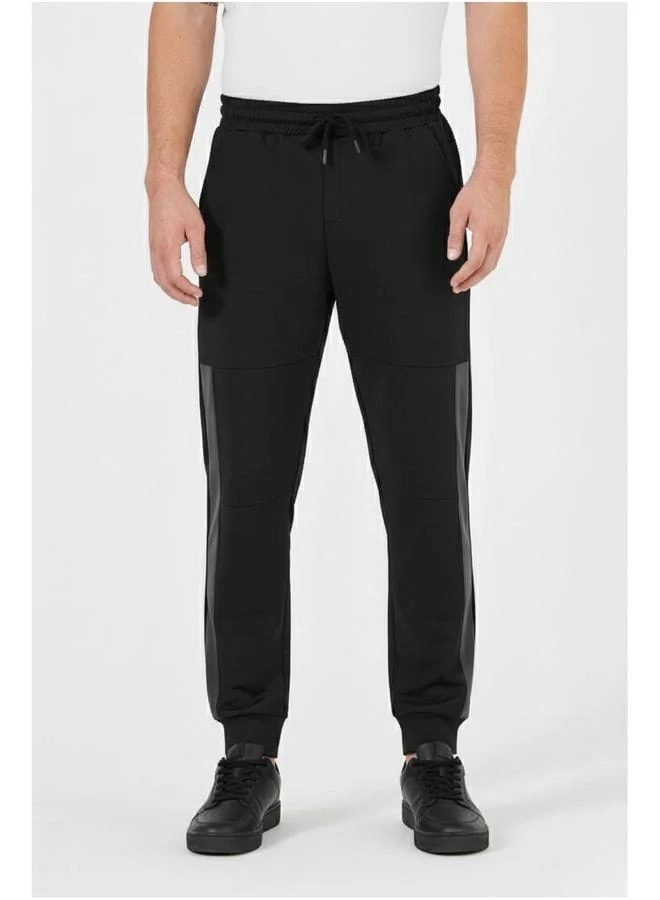 mmetalic Men’s Black Standard Fit Regular Cut Ribbed Cuff Pocketed Comfortable Jogger Sweatpants.