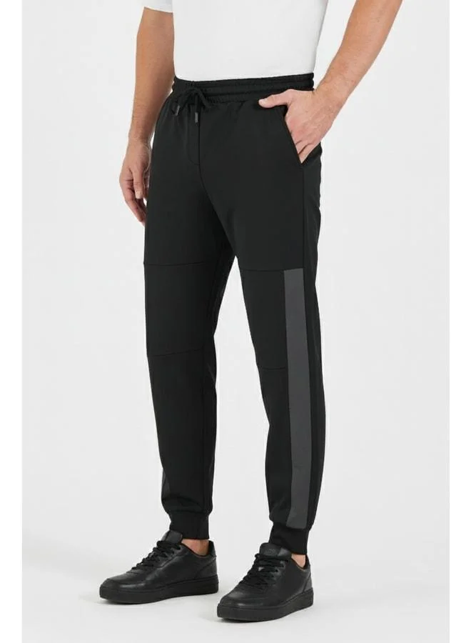 mmetalic Men’s Black Standard Fit Regular Cut Ribbed Cuff Pocketed Comfortable Jogger Sweatpants.