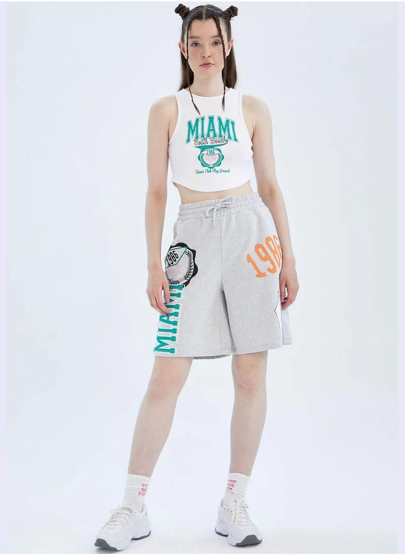 DeFacto Fitted Sleeveless City Print Crop Top