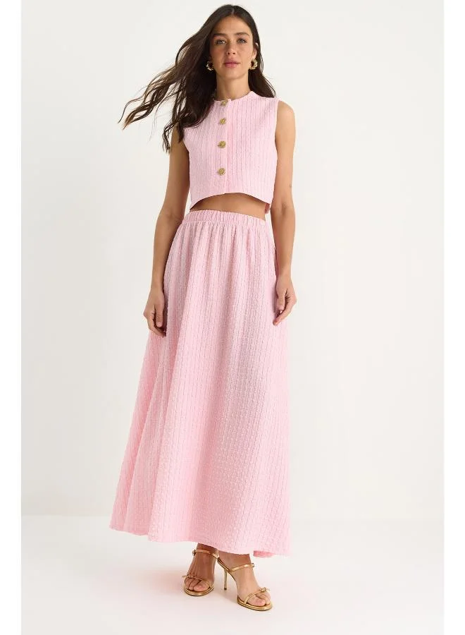 جينجر طقم سترة وتنورة بأزرار