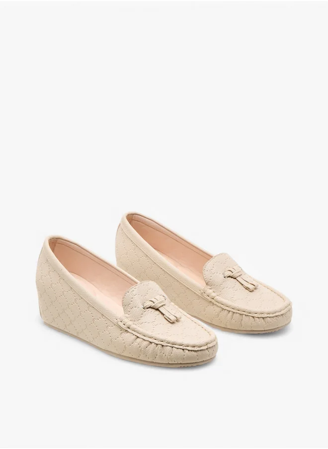 لو كونفورت Monogram Embossed Moccasins with Wedge Heels