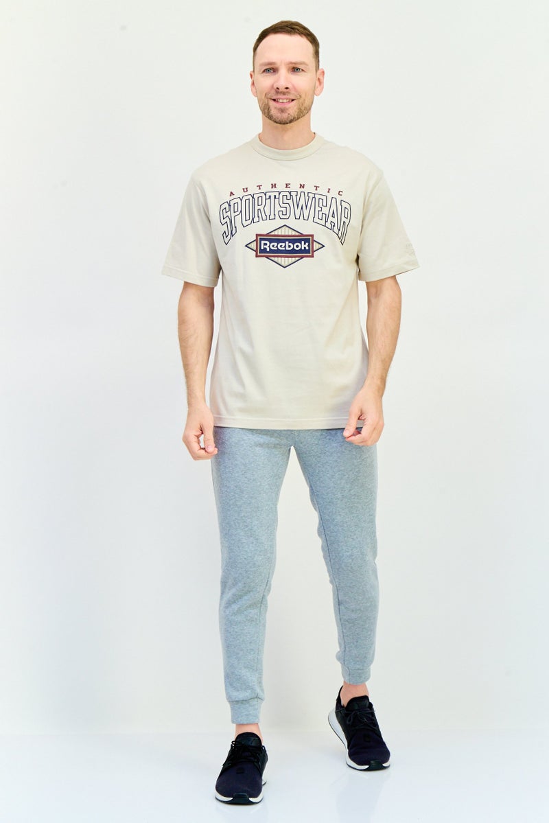 Reebok تي شيرت رياضي للرجال بأكمام قصيرة مناسب في الهواء الطلق، بيج - Image 4