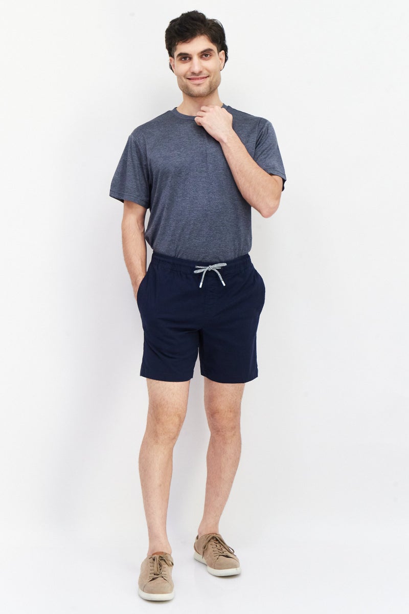 PERRY ELLIS شورتات تشينو صلبة للرجال بطول 9 إنش، كحلي - Image 3