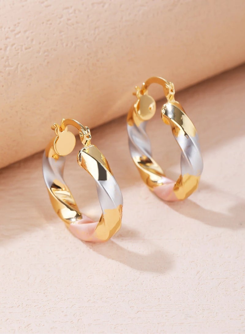 اقراط نسائية بتصميم ملفوفه باللون الذهبي و الفضي - Image 1