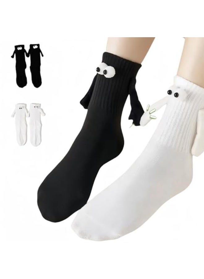 Mordely 2 Pairs Funny Magnetic Holding Hands Socks for Couples & Friends, Black and White Novelty Crew Socks with 3D Eyes and Arms, Cute Matching Gift Socks for Women and Men - Image 1