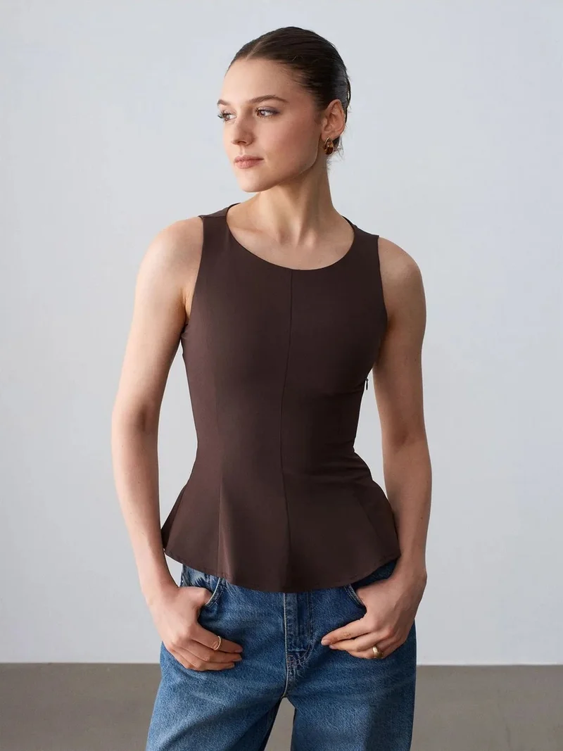 ديلفين DILVIN Fitted Sleeveless Crepe Peplum Blouse