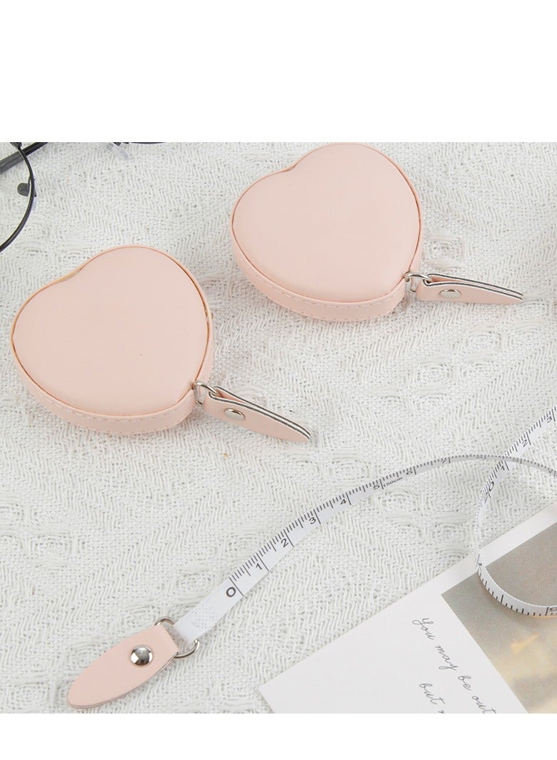 شريط قياس صغير على شكل قلب، مسطرة ناعمة، محمول، شريط قياس قابل للسحب تلقائيًا للملابس والجلود، بمقياس 1.5 متر - Image 1