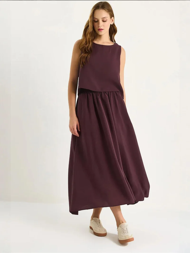 بيانكو لوتشي Sleeveless Scoop Neck Tank Top and Midi Skirt Co-Ord Set