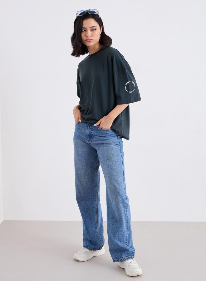 Styli Charcoal Oversized Slogan Print T-Shirt - Image 1