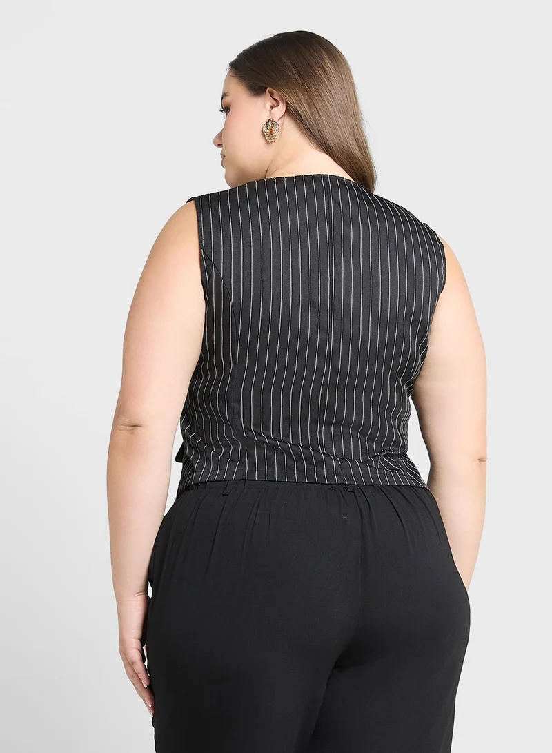 جينجر بلس صدرية بأزرار مخططة