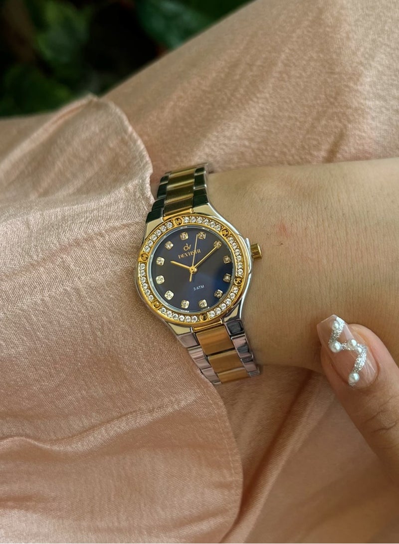 Devushi Elegant wrist watch decorated with zircon stones and an attractive design for women - Image 1