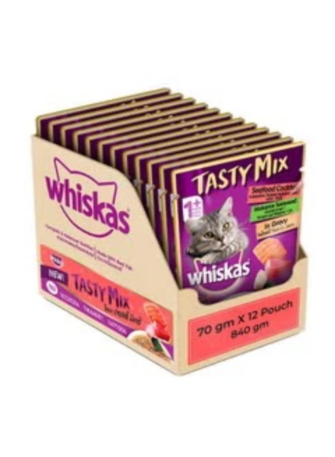 ويسكاس طعام القطط الرطب اللذيذ للبالغين (1+ سنة) المصنوع من الأسماك الحقيقية وكوكتيل المأكولات البحرية والأعشاب البحرية واكامي في المرق - عبوة من 12 قطعة (70 جرام × 12 قطعة) - Image 1