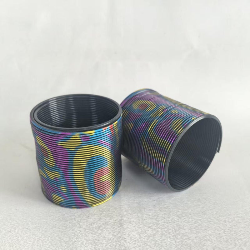 A Colorful Spring Toy 1pc With Golden Foil Art And Vibrant Laser Prints Safe Plastic Stackable Stretchable - Image 4