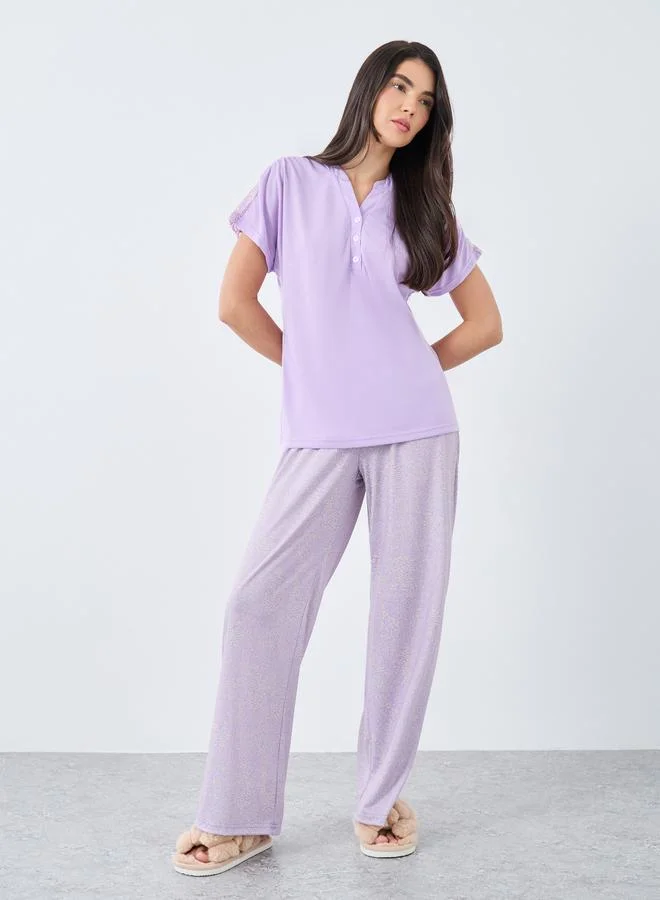 Styli Styli Notch Neck Placket Lace Back T-Shirt and Leopard Pyjama Set